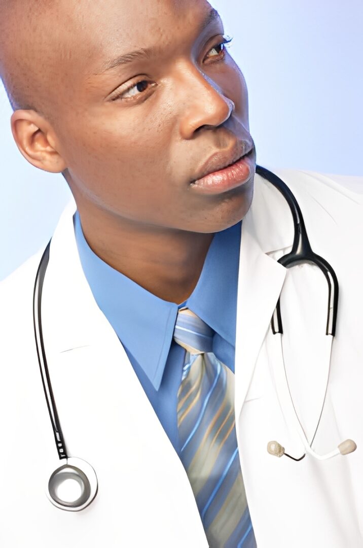 Doctor wearing blue shirt and stethoscope.